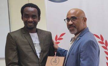 USM Honours Henry Michel for 35th Anniversary Logo Design