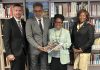 Prime Minister Dr. Luc Mercelina Donates Sint Maarten Book to the Library of the Minister Plenipotentiary of Curaçao