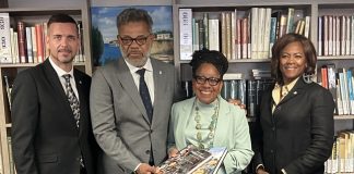 Prime Minister Dr. Luc Mercelina Donates Sint Maarten Book to the Library of the Minister Plenipotentiary of Curaçao