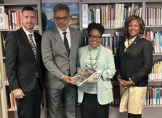 Prime Minister Dr. Luc Mercelina Donates Sint Maarten Book to the Library of the Minister Plenipotentiary of Curaçao