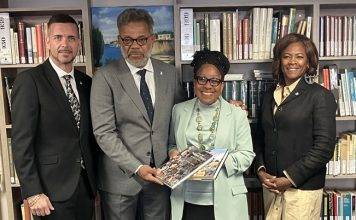 Prime Minister Dr. Luc Mercelina Donates Sint Maarten Book to the Library of the Minister Plenipotentiary of Curaçao