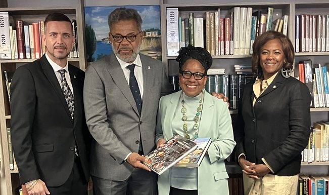 Prime Minister Dr. Luc Mercelina Donates Sint Maarten Book to the Library of the Minister Plenipotentiary of Curaçao