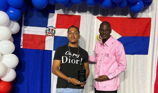 Minister Brug joins La Fundacion Semana Dominicana in celebrating Mr. Angel Morel Jr.