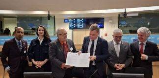 SER Curaçao signs international cooperation agreement in Brussels