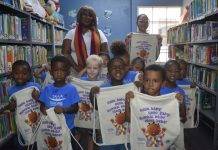 From Curiosity to Cards: Young Readers Embrace the Library in Fun-Filled Visit