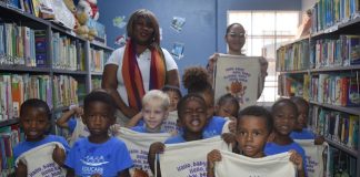 From Curiosity to Cards: Young Readers Embrace the Library in Fun-Filled Visit