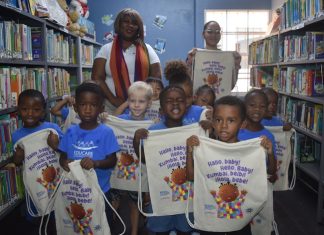 From Curiosity to Cards: Young Readers Embrace the Library in Fun-Filled Visit