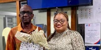 Finance Minister Gumbs pays tribute to Cedric Kirindongo on his 35 Years at Postal Services St. Maarten N.V.