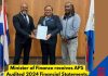Minister of Finance, Marinka Gumbs, Receives Audited 2024 Annual Report from APS