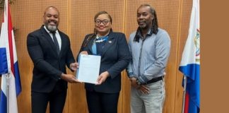 Minister of Finance, Marinka Gumbs, Receives Audited 2024 Annual Report from APS