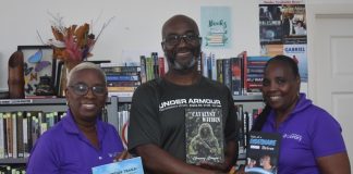 Rising Author Gramey Browne Donates Four Inspiring Titles to the Sint Maarten Library