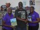 Rising Author Gramey Browne Donates Four Inspiring Titles to the Sint Maarten Library