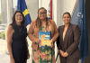 Minister of Finance, Marinka J. Gumbs, Presented with Historical NAf Book and Caribbean Guilder Collector’s Set