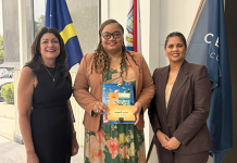 Minister of Finance, Marinka J. Gumbs, Presented with Historical NAf Book and Caribbean Guilder Collector’s Set