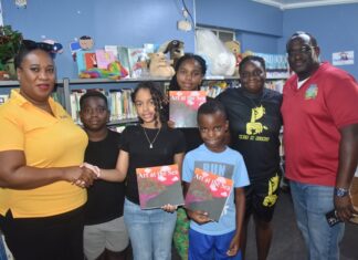 L.O.V.E 2 L.E.A.R.N. Foundation Donates Inspirational Book Art at the Sea to Sint Maarten Library