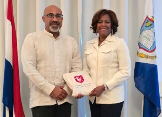 Minister Plenipotentiary Arrindell receives visit from the President of USM Dr. Carmona Báez