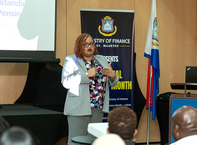 Minister of Finance Gumbs addressing attendees