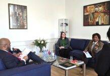 Minister Arrindell meets with Minister of VROMI Gumbs about Strengthening Cooperation