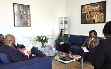 Minister Arrindell meets with Minister of VROMI Gumbs about Strengthening Cooperation