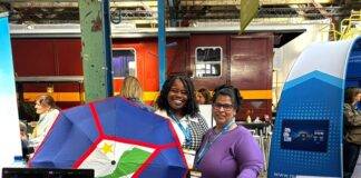 Communication Specialist Erieenne Brandao (left) and Director of Tourism Maya Pandt at TravDay 2026