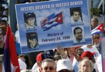 US raises pressure on Cuba with indictment of former leader as island’s president condemns charges