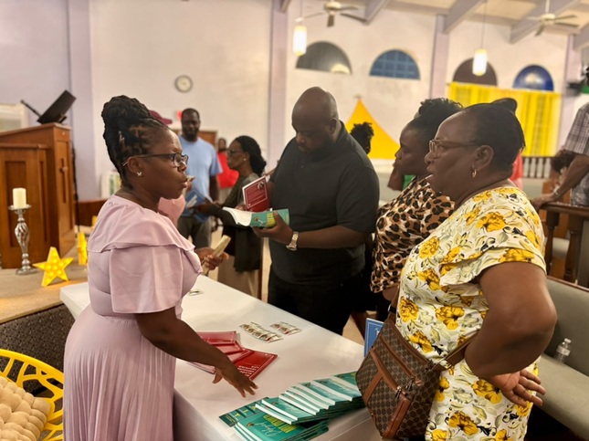 Vanessa Farrell speaks to attendees at Matters of the Heart - Know Your Numbers Seminar at Victory Temple COGOP on June 4 2026