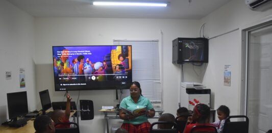 Spreading Sunshine Through Story Time at the Sint Maarten Library