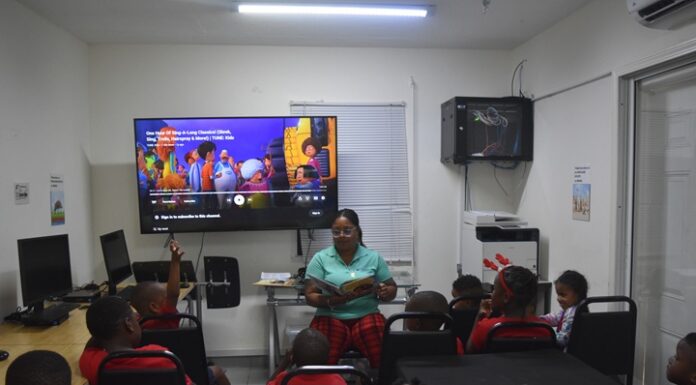 Spreading Sunshine Through Story Time at the Sint Maarten Library