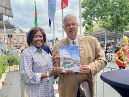 Minister Plenipotentiary Arrindell attends International Four Days Marches. Mayor Bruls Presented with Token of Appreciation