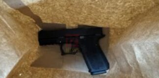 Scooter rider arrested with firearm.