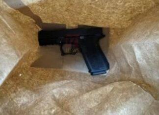 Scooter rider arrested with firearm.