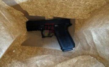 Scooter rider arrested with firearm.