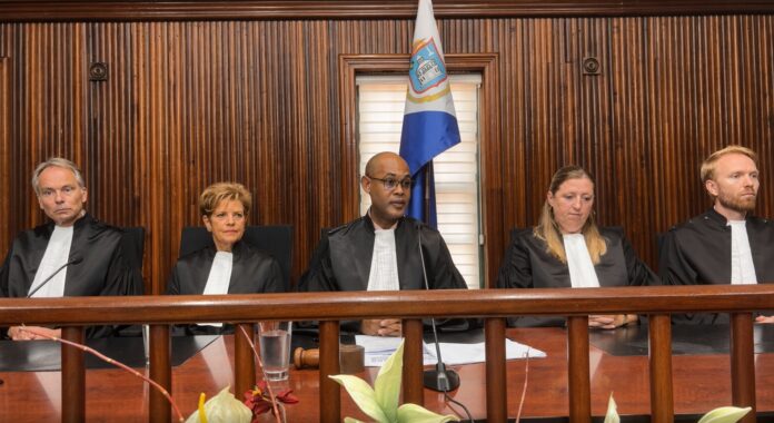 New judges sworn in on Sint Maarten say justice must fit a small island and that young people need a real “home”