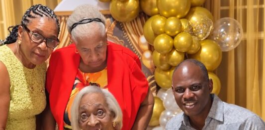 Richinel Brug congratulates Mrs. Dorothy Serrant on her remarkable 100th birthday