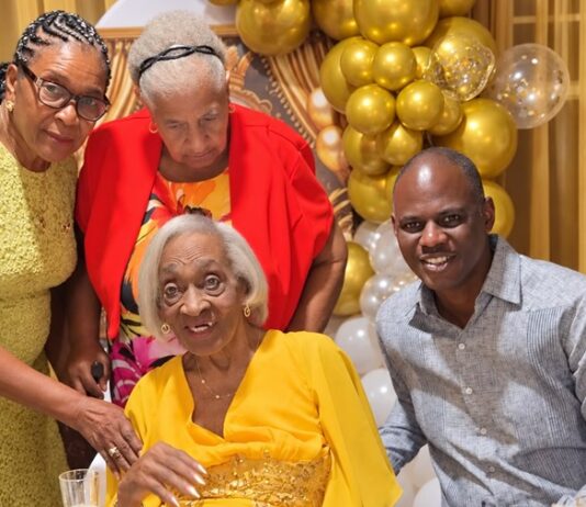 Richinel Brug congratulates Mrs. Dorothy Serrant on her remarkable 100th birthday