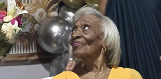 Richinel Brug congratulates Mrs. Dorothy Serrant on her remarkable 100th birthday