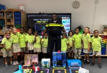 Community Officer Rexcarlos Courtar introduces himself to partners across Sint Eustatius