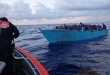 61 migrants pulled from overloaded, sinking boat in joint Caribbean rescue