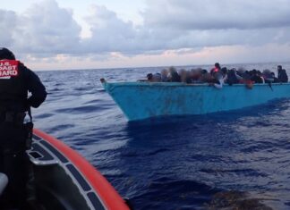 61 migrants pulled from overloaded, sinking boat in joint Caribbean rescue